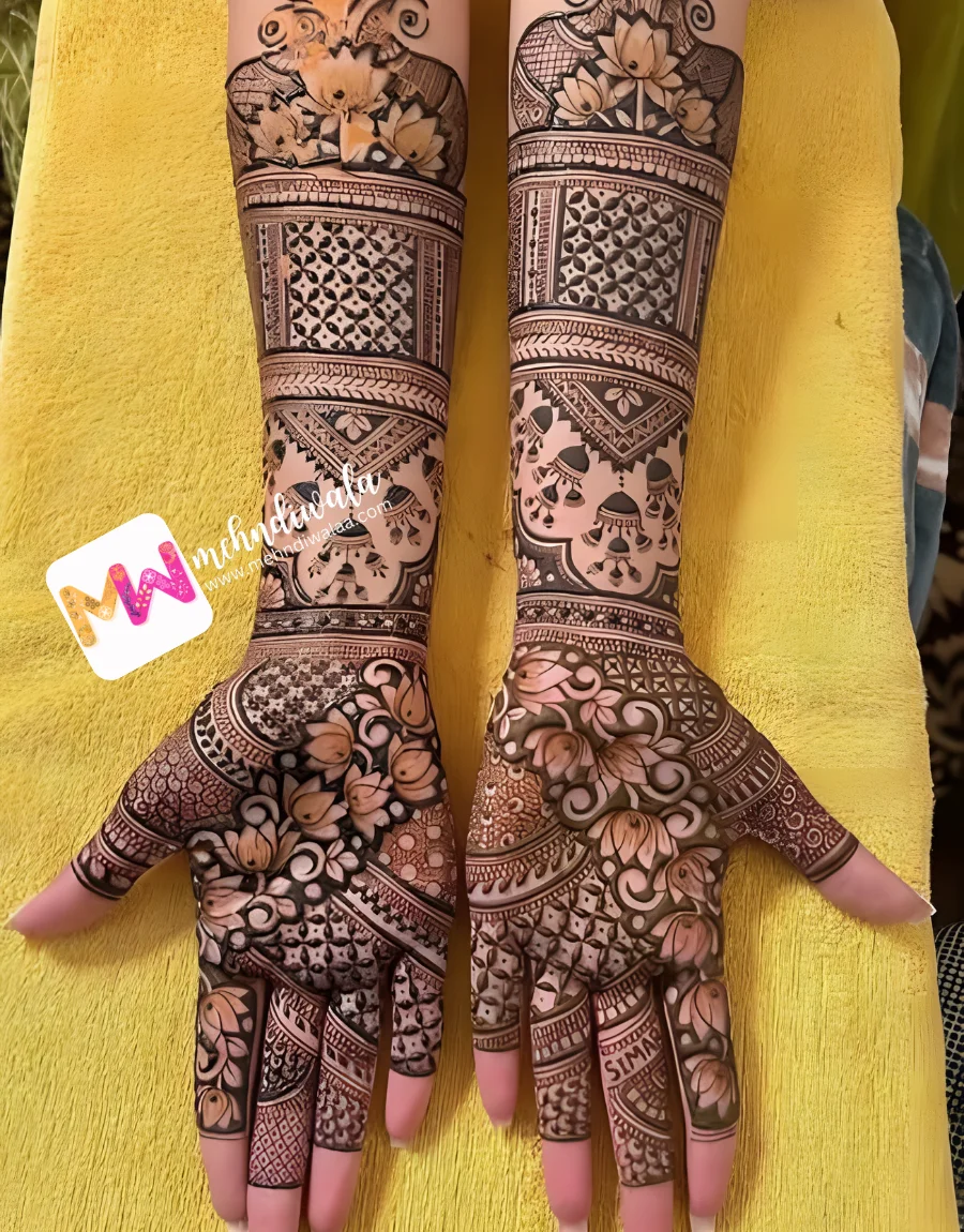 mehndi wala Premium 3D floral jhumki bridal mehndi design with checks and leaves by best bridal mehndi artist in India